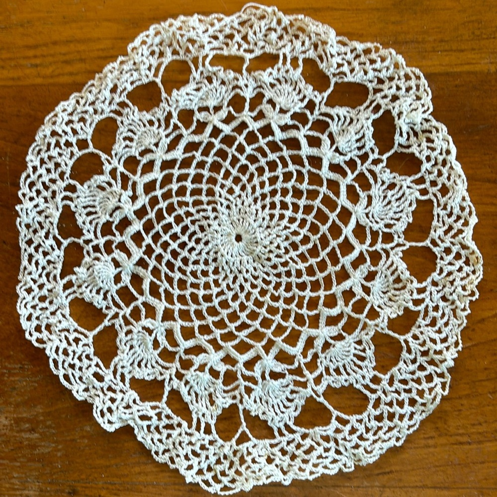 Vintage hand made thread 10” cream round crocheted doily